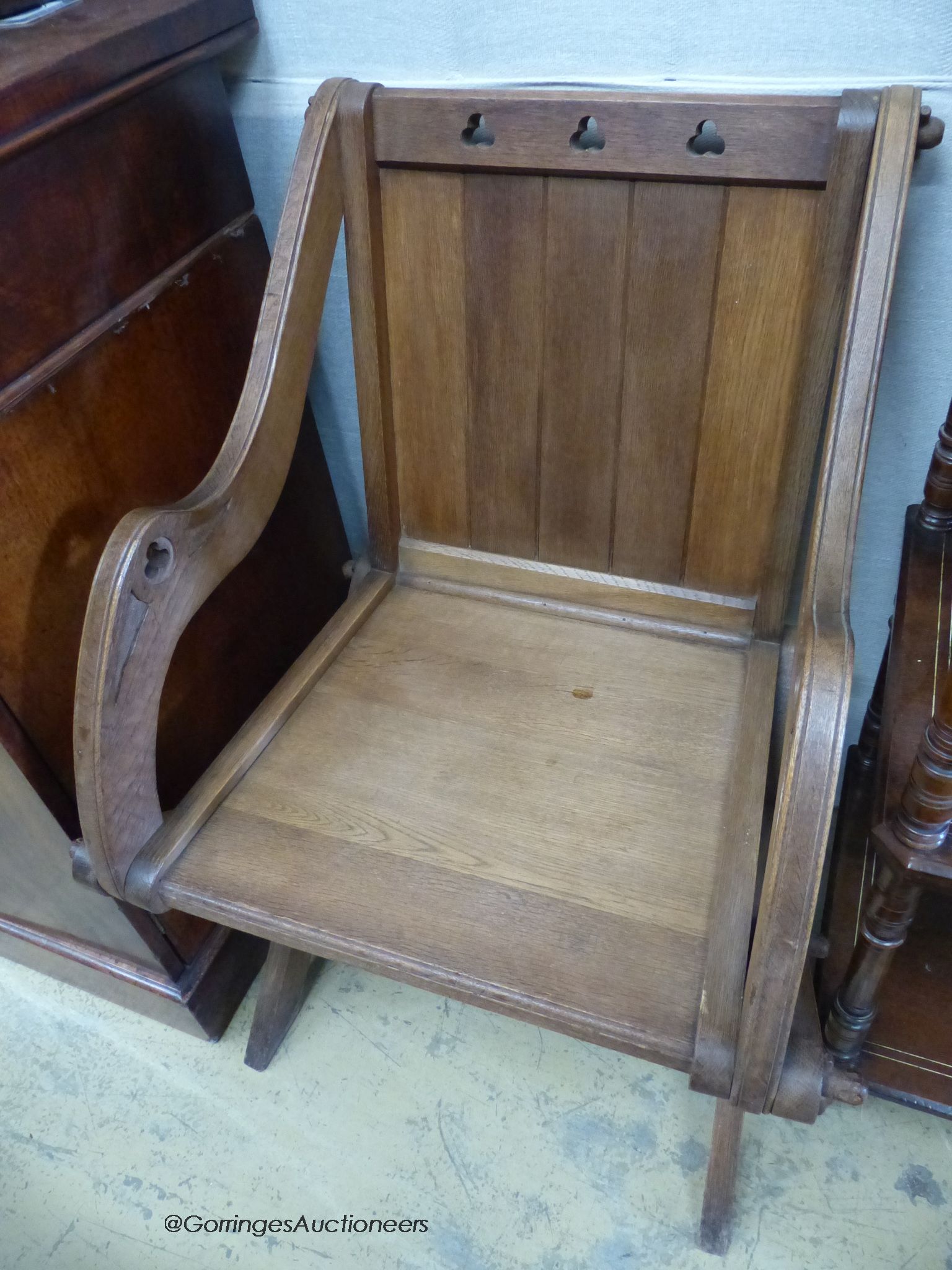 Three oak Glastonbury chairs.